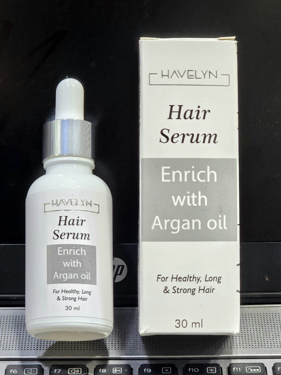 Close-up of Havelyn serum dropper and liquid texture
