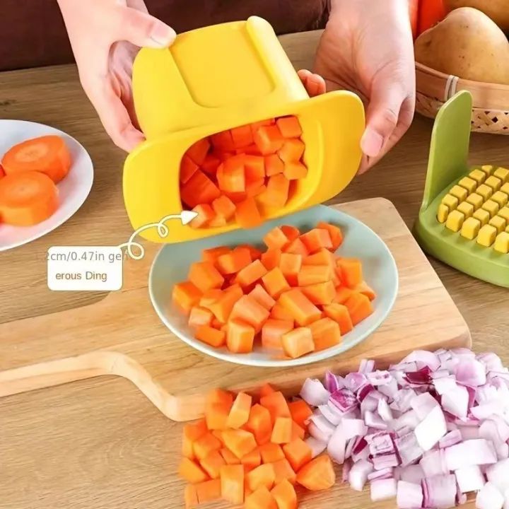 Hand using the vegetable chopper to dice an onion into uniform pieces