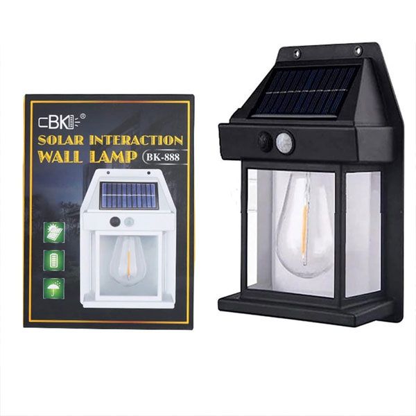 Solar sensor light activated at night, showing warm tungsten glow