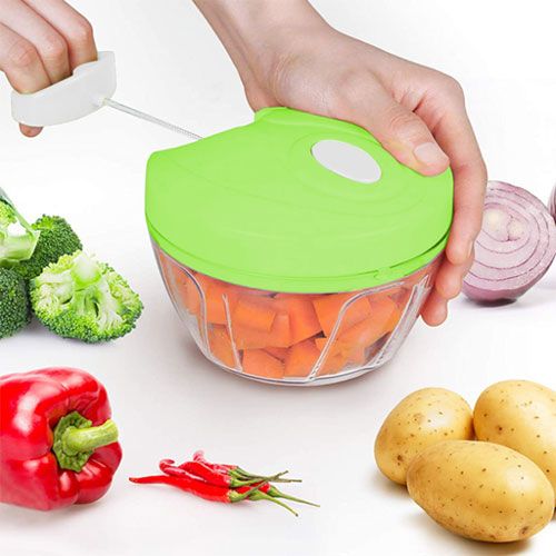 Speedy Chopper Pro electric food chopper on a kitchen counter